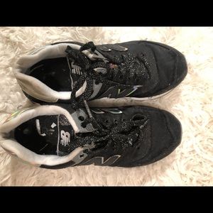 2 pairs of new balance shoes